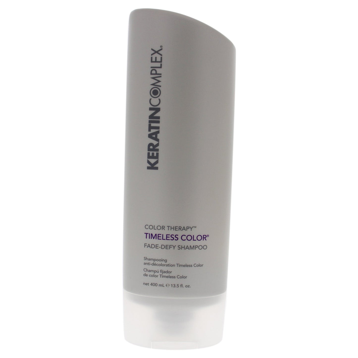 Keratin Complex Timeless Color Fade-Defy Shampoo in a 13.5 oz bottle, designed to protect and enhance colored hair.