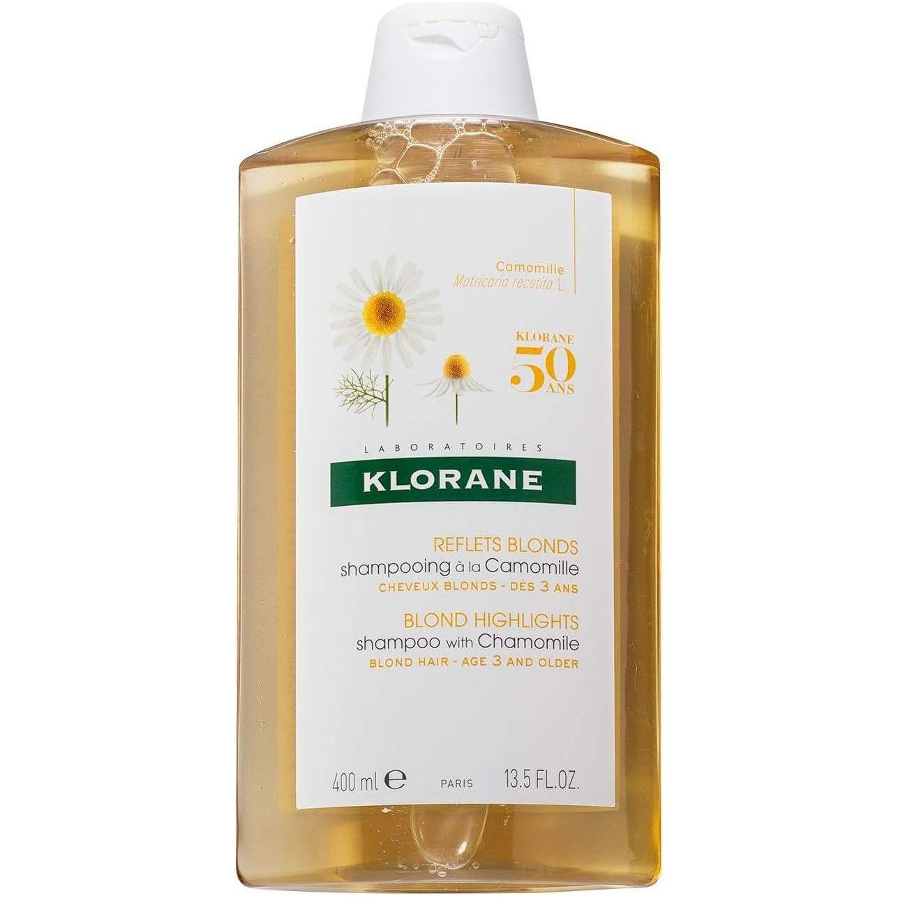 Klorane Blonde Highlights Brightening Shampoo with Chamomile in 13.5oz bottle, designed to enhance blonde hair brightness.