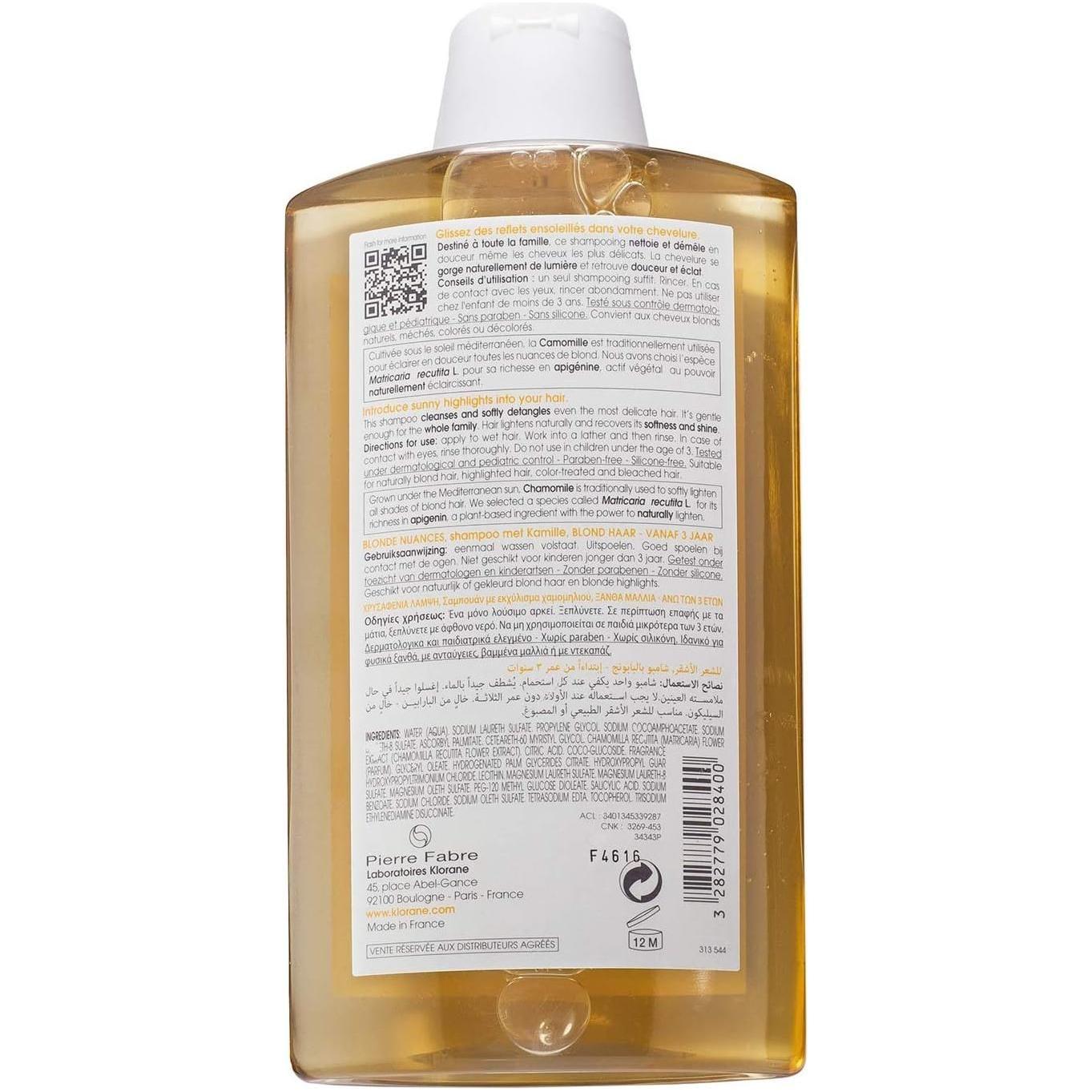 Klorane Blonde Highlights Brightening Shampoo with Chamomile in a 13.5oz bottle, designed to enhance blonde hair brightness and shine.