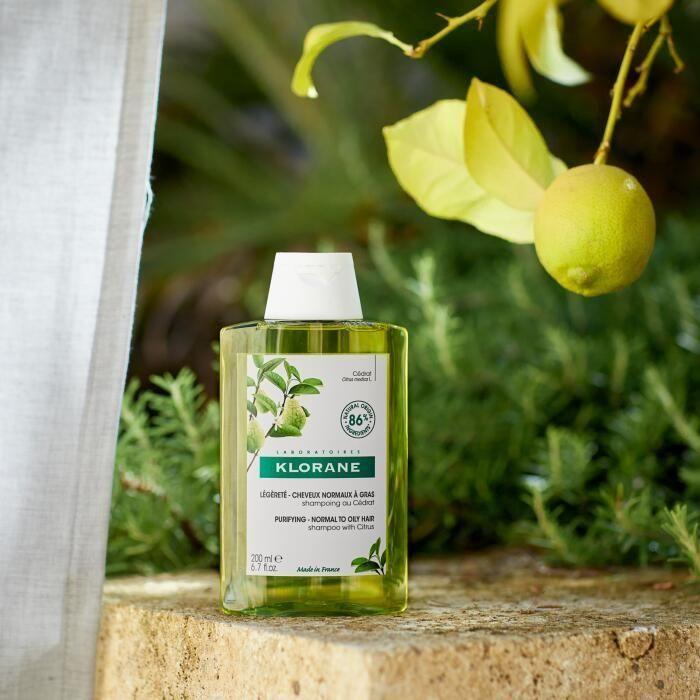 Klorane Purifying Shampoo for normal to oily hair with citrus, 13.5oz, in a clear bottle with citrus accents.