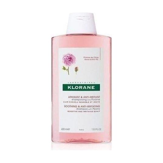 Klorane Shampoo with Peony 13.5 oz bottle, natural plant-based hair cleansing shampoo with floral extract, on a retail shelf