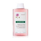 Klorane Shampoo with Peony 13.5 oz bottle, natural plant-based hair cleansing shampoo with floral extract, on a retail shelf