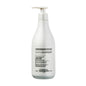 L'Oreal Professionnel Serie Expert Magnesium Silver Shampoo bottle with silver and purple label, designed for blonde or gray hair care.