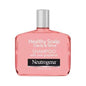 Neutrogen Pink Grapefruit Clarify & Shine Shampoo by Pasteur Pharmacy, 12 oz bottle with pink grapefruit branding.