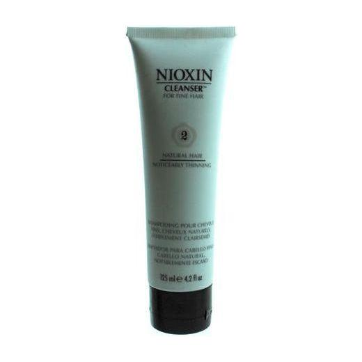 Nioxin System 2 Cleanser Shampoo for thinning fine hair, 4.2 fl oz, in a clear bottle with white shampoo and blue accents.