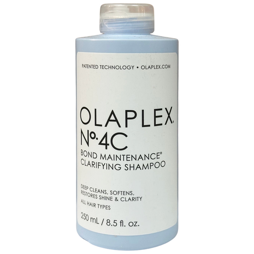 Olaplex No. 4C Bond Maintenance Clarifying Shampoo in a clear bottle with a pump dispenser, designed for deep cleansing hair.