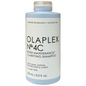 Olaplex No. 4C Bond Maintenance Clarifying Shampoo in a clear bottle with a pump dispenser, designed for deep cleansing hair.