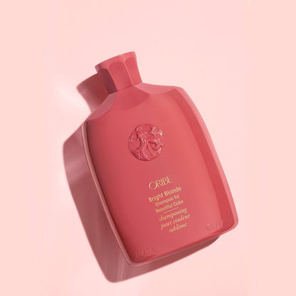 Oribe Bright Blonde Shampoo for beautiful color in 250 ml bottle, featuring a sleek design and bright packaging.