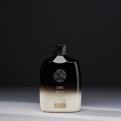 Oribe Gold Lust Repair & Restore Shampoo in 250ml bottle, featuring luxurious hair care formula, shown in sleek packaging.