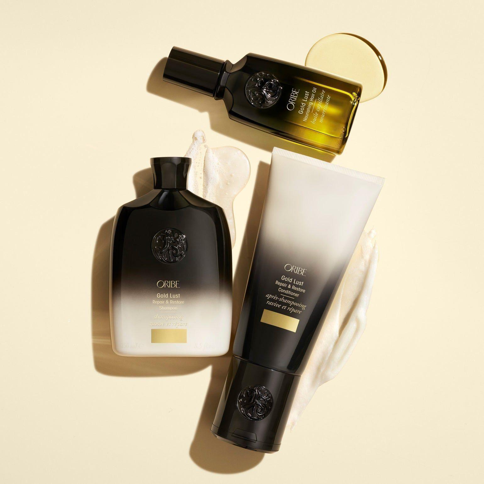 Oribe Gold Lust Repair & Restore Shampoo 250ml bottle with sleek gold label and pump dispenser.