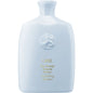 Oribe Run-Through Detangling Shampoo in 8.5 oz bottle, smooths and detangles hair, natural hair care by Pasteur Pharmacy.
