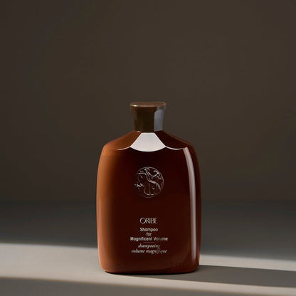 Oribe Shampoo for Magnificent Volume in 250 ml bottle, featuring a sleek design and rich lather for voluminous hair.
