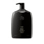 Oribe Signature Shampoo bottle with sleek design, showcasing the premium shampoo used for nourishing hair.