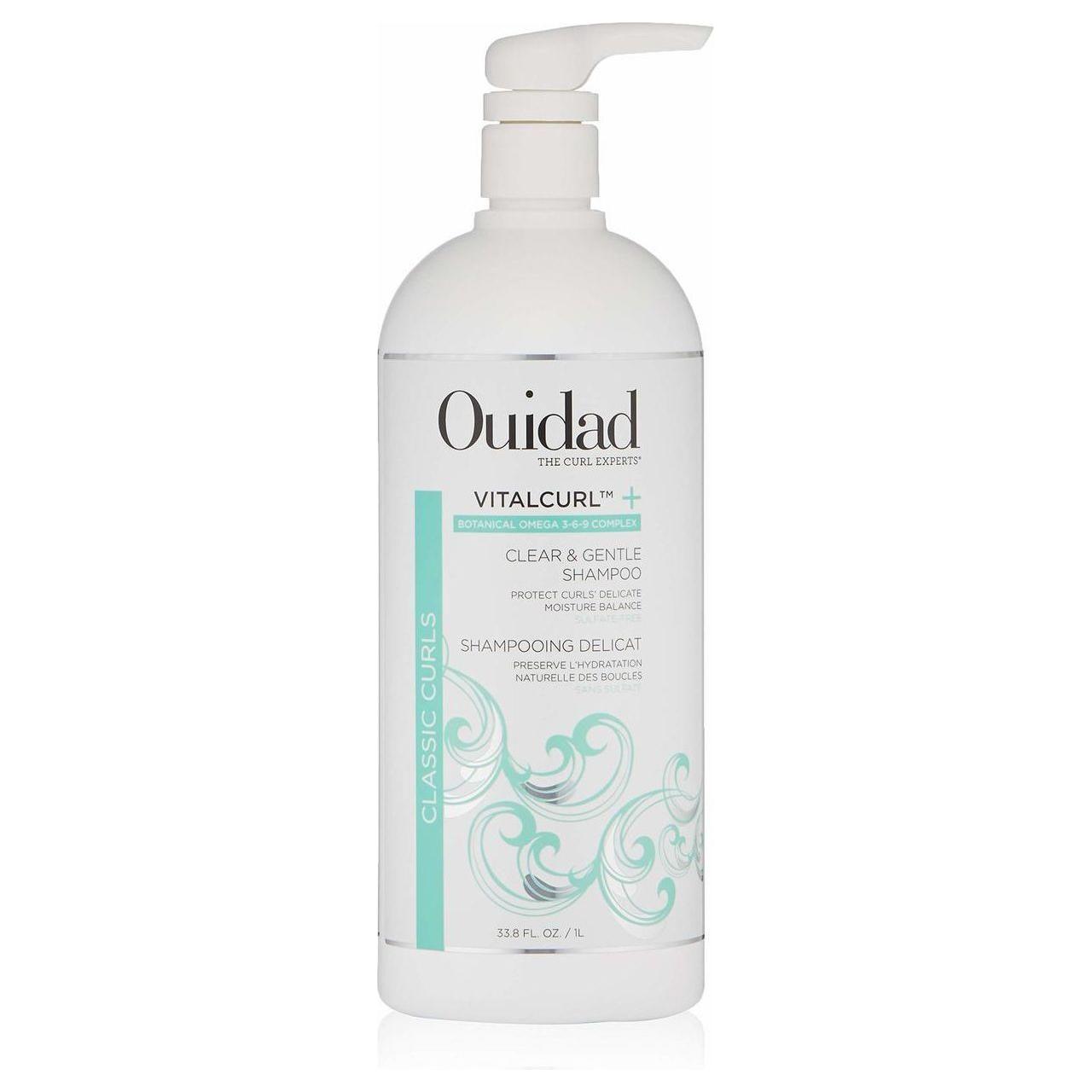 Ouidad Clear & Gentle Shampoo bottle, 33.8oz, in a clear plastic container with a white and green label showing the product name.