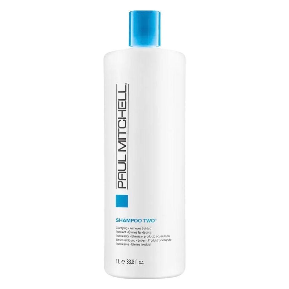 Paul Mitchell Clarifying Shampoo Two in a large 33.8 fl oz bottle, designed to cleanse and refresh hair effectively.