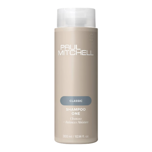 Paul Mitchell Classic Shampoo One 10.14oz bottle with white and blue packaging, shown in a retail display.