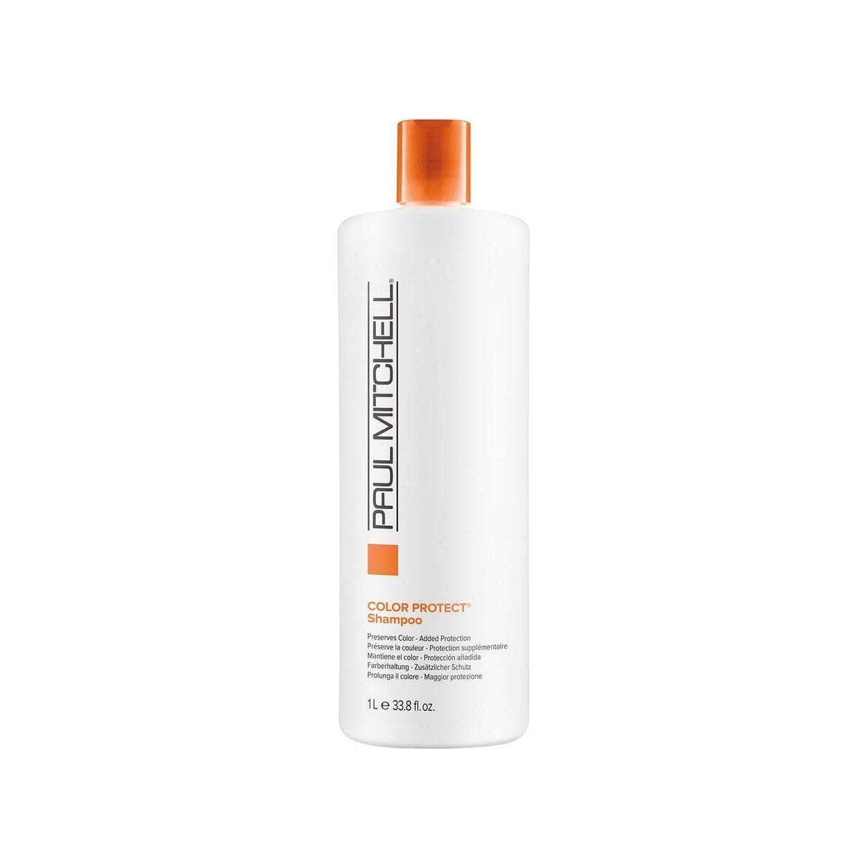 Paul Mitchell Color Protect Daily Shampoo in 33.8 fl oz bottle, designed to preserve vibrant hair color and gently cleanse.