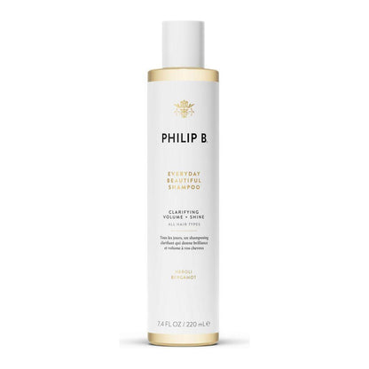 Philip B. Everyday Beautiful Shampoo in 7.4 oz bottle, with clear label, shown in a natural, clean setting.