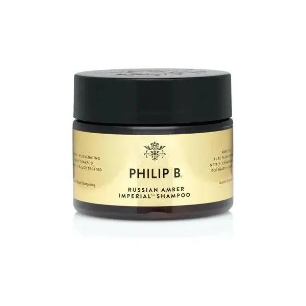 Philip B. Russian Amber Imperial Shampoo in 12 oz bottle, featuring a sleek design and labeled for nourishing hair care.