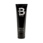 Tigi Bed Head for Men Clean Up Shampoo 8.45oz in a clear bottle with a black cap, designed for men's hair care.