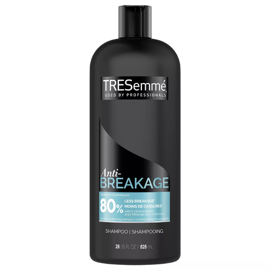 TRESemme Anti Breakage Defense Shampoo in a 28 Fl Oz bottle, featuring a clear bottle with purple and white label, for damaged hair.