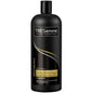 TRESemme Moisture Rich Vitamin Shampoo in 28 Fl Oz bottle, featuring nourishing formula for hydrated hair