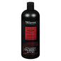TRESemme Pro Solutions Color Revitalize Shampoo in 28 Fl Oz bottle, designed to enhance and maintain vibrant hair color.