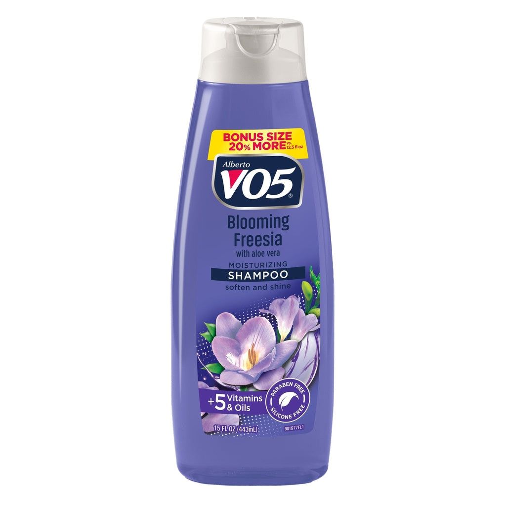 VO5 Herbal Escapes Shampoo with Blooming Freesia and Aloe Vera, 15 oz bottle, featuring floral and aloe vera ingredients.
