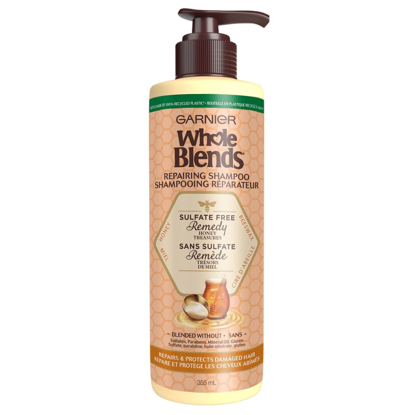 Garnier Whole Blends sulfate-free honey shampoo for very damaged hair in a 12 Fl Oz bottle, with honey and nourishing ingredients.
