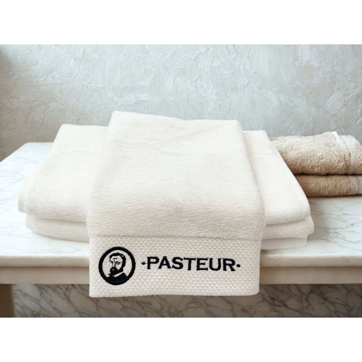Pasteur Pharmacy Pasteur Shave Towel with classic logo, soft cotton material, small 12x12-inch size for grooming and shaving.