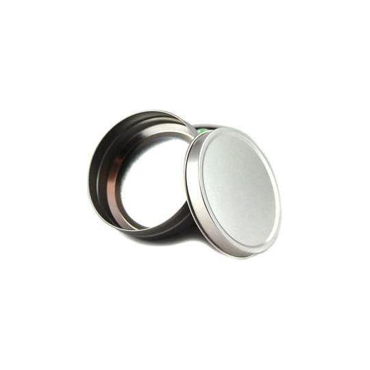 Small Stirling Soap Co. shaving tin from Pasteur Pharmacy, featuring a compact metal container for shaving soap storage.