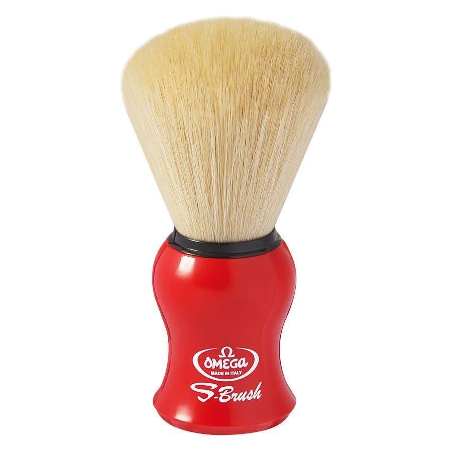 Omega synthetic fiber shaving brush with colorful handle, featuring dense bristles for a smooth shave, by Pasteur Pharmacy.