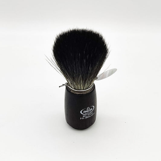 Omega shaving brush with synthetic fiber bristles, featuring a wooden handle, designed for a smooth shaving experience.