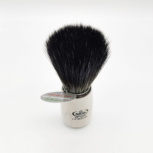 Omega White Shaving Brush by Pasteur Pharmacy with synthetic fiber bristles and white handle for a smooth shaving experience.