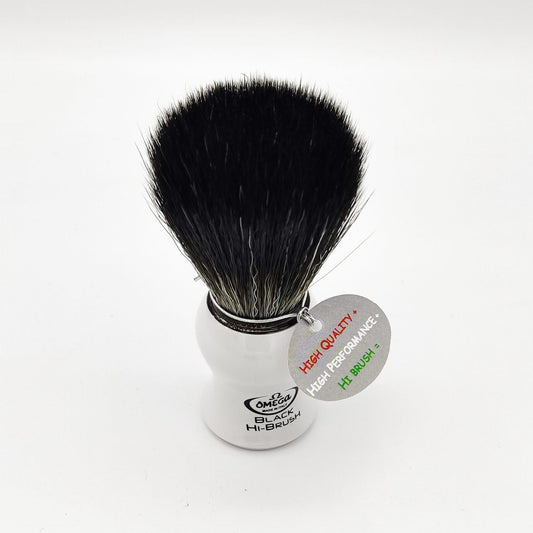 Omega shaving brush with white handle and synthetic fiber bristles, designed for a smooth shaving experience.