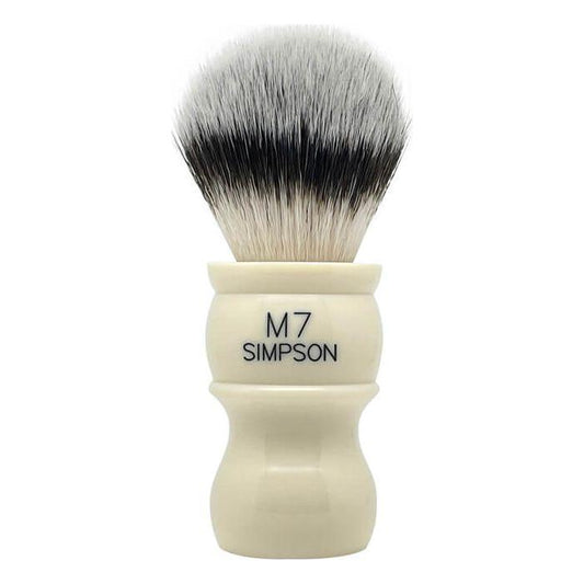 Simpson M7 Sovereign Grade synthetic fiber shaving brush with a black handle and dense bristles for a smooth shave.