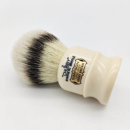 Simpsons Chubby 2 synthetic badger hair shaving brush with a sturdy handle, ideal for smooth, luxurious shaving experiences.
