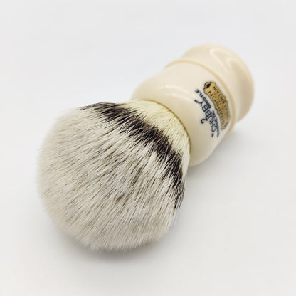 Simpsons Chubby 2 synthetic badger hair shaving brush with a rounded handle and dense bristles for a smooth shave.