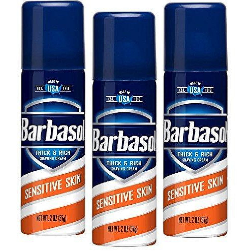 Barbasol Sensitive Skin Thick & Rich Shaving Cream for Men in 2oz travel size, creamy shaving product in a white and blue jar