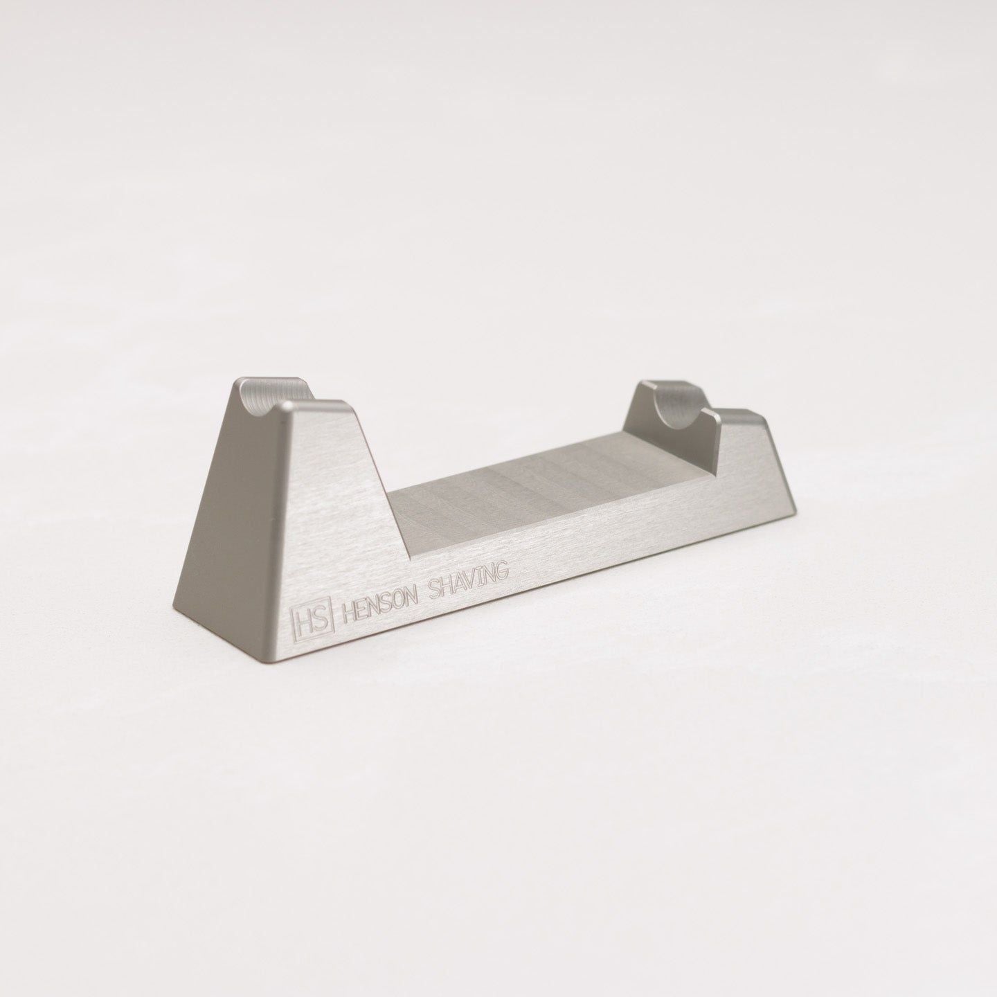 Henson Shaving Razor Stand by Pasteur Pharmacy displaying a sleek metal stand for razor storage and organization