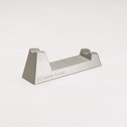 Henson Shaving Razor Stand by Pasteur Pharmacy displaying a sleek metal stand for razor storage and organization