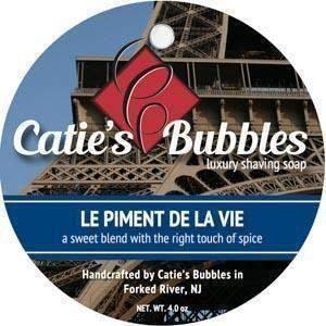 Pasteur Pharmacy Catie's Bubbles Le Piment de la Vie shaving set with soap, brush, and accessories in a stylish grooming collection.