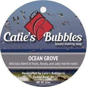 Shaving set with Ocean Grove soap by Catie's Bubbles, including a 4oz shaving soap and accessories, displayed on a clean surface.