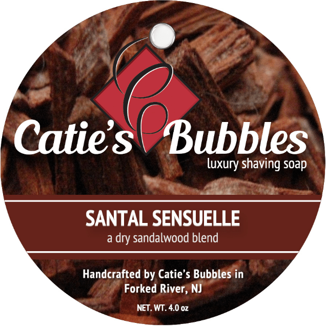 Catie's Bubbles Santal Sensuelle shaving set with 4oz shaving soap in a sleek container, part of Pasteur Pharmacy's shaving collection.