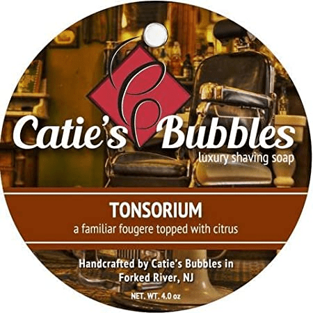 Pasteur Pharmacy Catie's Bubbles Tonsorium Shaving Collection set with shaving soap in a 4oz container and shaving accessories.