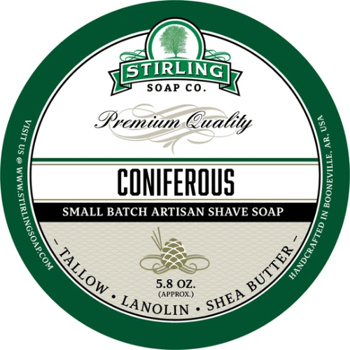Coniferous shaving set by Stirling Soap Co. featuring shaving soap, brush, and accessories in a sleek grooming collection.