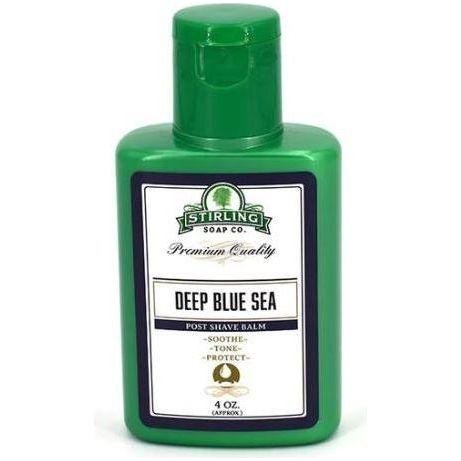Deep Blue Sea Shaving Set by Stirling Soap Co. featuring shaving soap, brush, and accessories on a clean surface