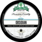 Stirling Soap Co. Glacial Obsidian shaving set with soap, brush, and accessories in a sleek grooming collection.