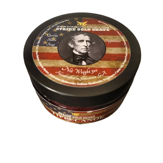 Pasteur Pharmacy Strike Gold Shave Tippcanoe Shaving Collection with shaving soap and accessories, set in a stylish packaging.