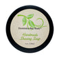 Handmade Dominica Bay Rum shaving soap by Pasteur Pharmacy, 4 oz, with a creamy lather and natural bay rum scent.